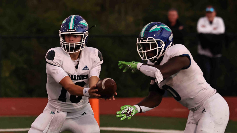 Winton Woods quarterback Vance George and running back Trey Cornist, shown during their Sept. 30 football game against Kings, lead the Warriors to their No. 1 ranking, per the Associated Press.