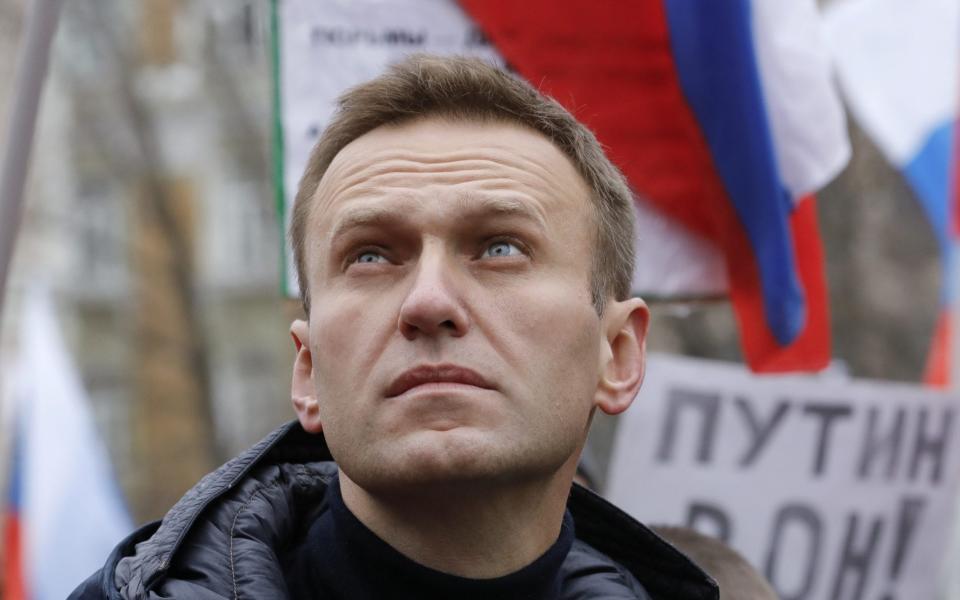 Russian opposition leader Alexei Navalny attends a rally in memory of politician Boris Nemtsov in Moscow - REUTERS