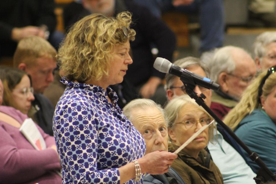 Susan Dangel of Mashpee Clean Waters and Save Mashpee Wakeby Pond Alliance spoke to annual town meeting attendees about water quality in Mashpee.
