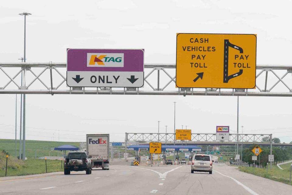 Motorists currently may either use the drive-through K-TAG lanes or stop at the toll plaza to leave the Kansas Turnpike at its East Topeka interchange, as shown in this photo. All drivers will keep moving when they leave the turnpike after the Kansas Turnpike Authority implements cashless tolling at 11:59 p.m. June 30.