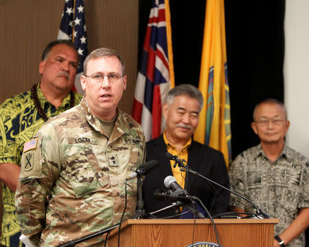 U.S. Army Maj Gen Arthur J. Logan (2nd L) speaks at a news conference, along with Kauai Mayor Bernard Carvalho (L), Hawaii Gov. David Ige (2nd R) and Vern Miyagi, administrator for the Hawaii Emergency Management Agency, discussing the newly-activated Attack Warning Tone intended to warn Hawaii residents of an impending nuclear missile attack, at the at the Civil Defense department at Diamond Head Crater in Honolulu, Hawaii, November 28, 2017. REUTERS/Marco Garcia