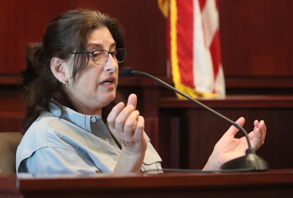 Joan Naydich, the paraprofessional attacked by Brendan Depa in 2023 at Matanzas High School, takes the stand, Wednesday, May 1, 2024, during Depa's sentencing at the Kim C. Hammond Justice Center in Bunnell.