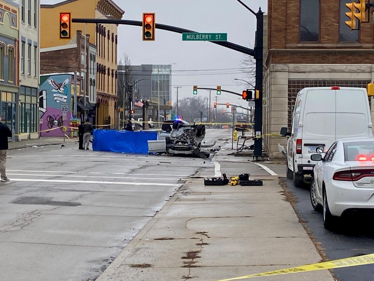 Muncie police are investigating a fatal car accident that happened at Mulberry and Main streets Tuesday, Jan. 23, 2024, during a police chase. One person was killed in the crash.