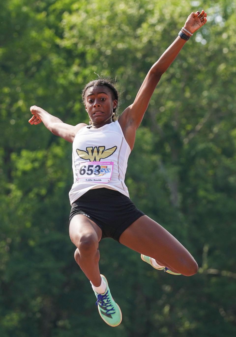 Warren Central's Laila Smith competes in the long jump Saturday, June 3, 2023, during the IHSAA girls track and field state finals at Robert C. Haugh Track and Field Complex at Indiana University in Bloomington. 