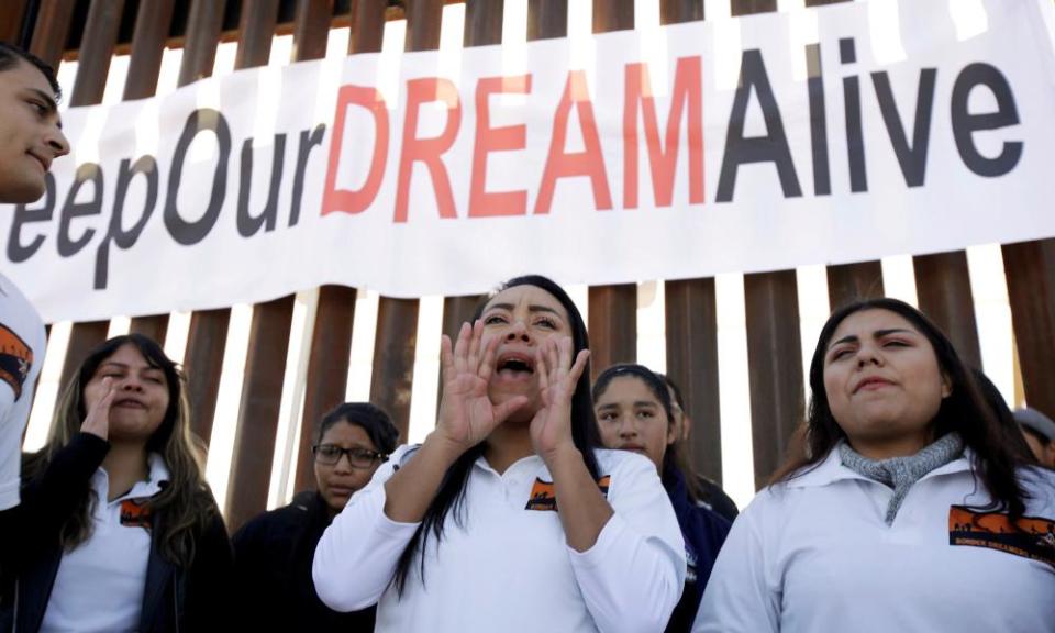 “Dreamers” react as they meet with relatives during a meeting on the US-Mexico border.