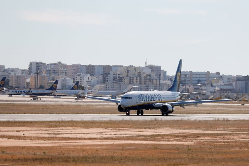 FILE PHOTO: British tourists return to Portugal