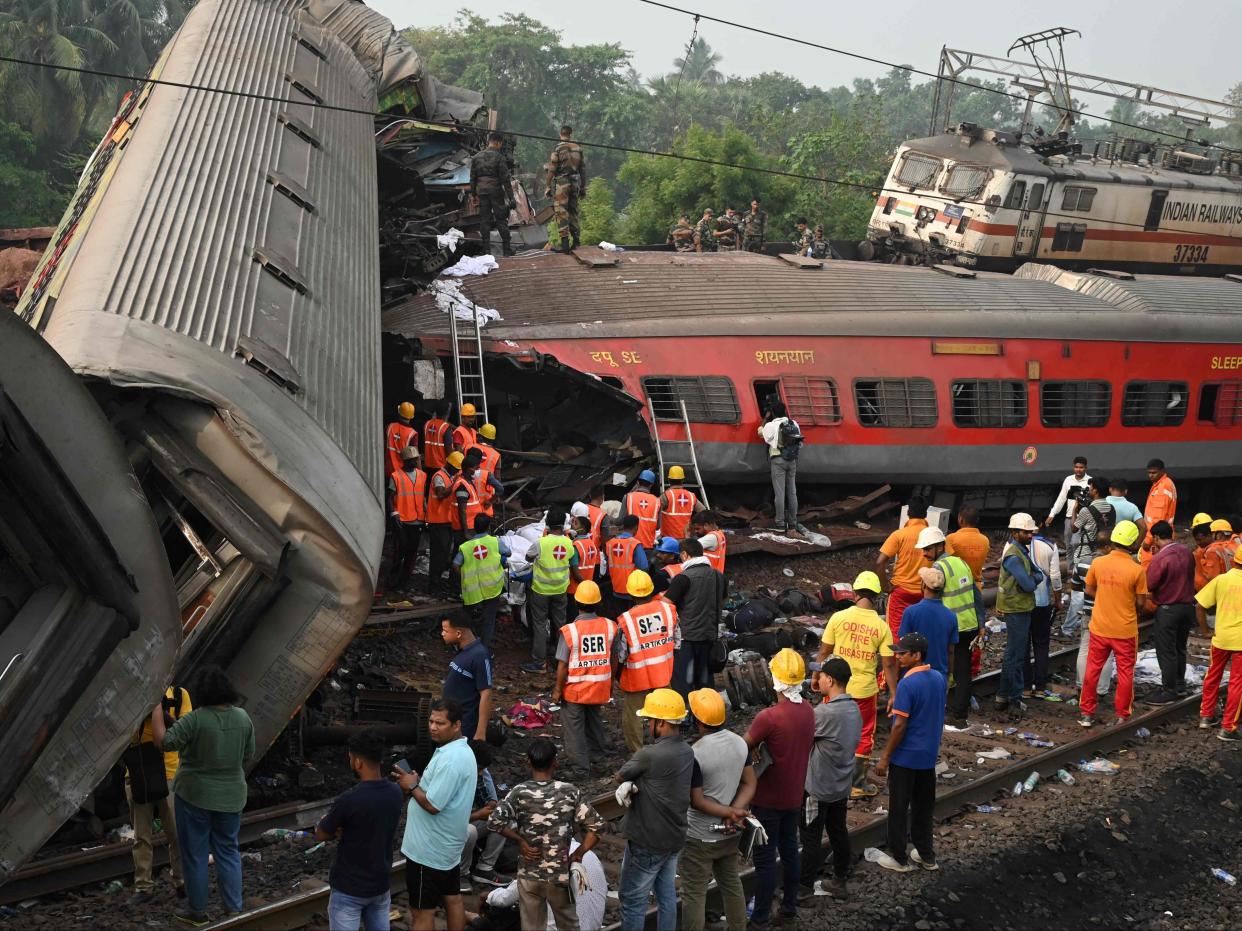 Rescue efforts continue following the crash (AFP via Getty Images)