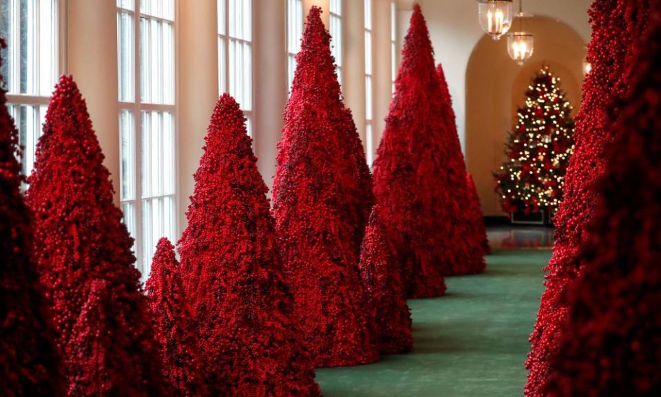 Trees made from red berries line the East Colonnade during the 2018 Christmas Press Preview at the White House in Washington, US, November 26, 2018.