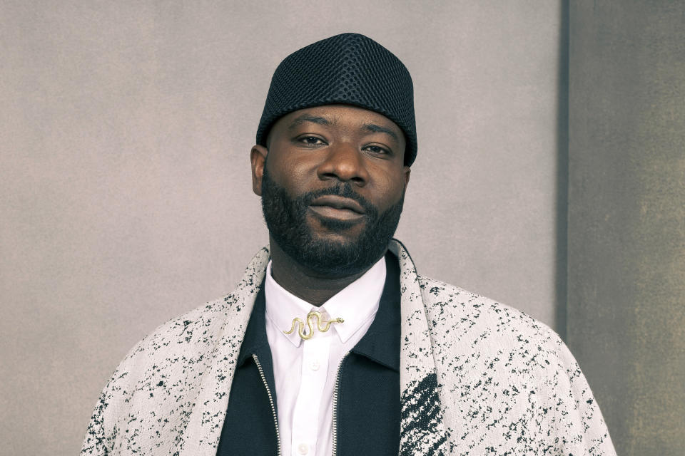 Blitz Bazawule poses for a portrait to promote the film "The Color Purple" on Thursday, Dec. 7, 2023, in Los Angeles. (Photo by Willy Sanjuan/Invision/AP)