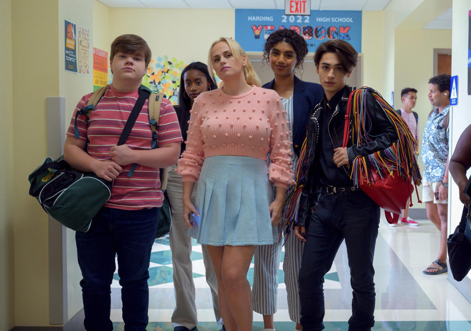 This image released by Netflix shows, foreground from left, Jeremy Ray Taylor, Rebel Wilson, Avantika and Joshua Colley in a scene from "Senior Year." (Boris Martin/Netflix via AP)