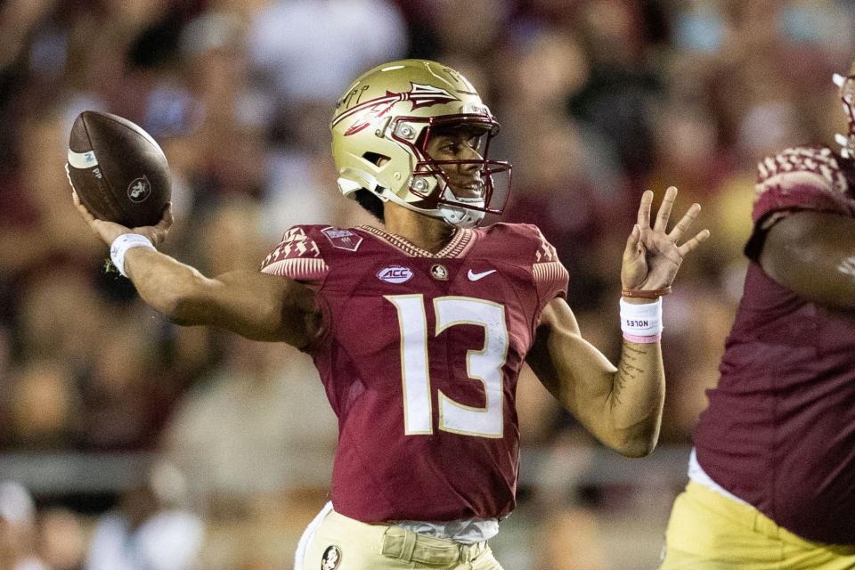 Florida State Seminoles quarterback Jordan Travis (13) winds up to pass. The Clemson Tigers defeated the Florida State Seminoles 34-28 at Doak Campbell Stadium on Saturday, Oct. 15, 2022.