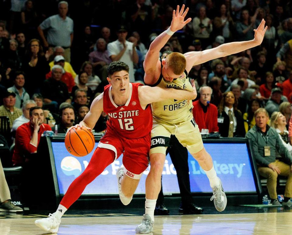 N.C. State’s Michael O’Connell drives past Wake Forest’s Cameron Hildreth during the second half of the Wolfpack’s 83-79 loss on Saturday, Feb. 10, 2024, at Lawrence Joel Veterans Memorial Coliseum in Winston-Salem, N.C. Kaitlin McKeown/kmckeown@newsobserver.com