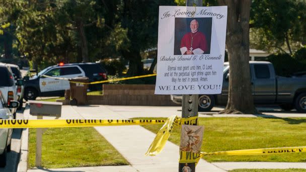 PHOTO: An image of Bishop David O'Connell is posted on the post of a street sign near his home, Feb. 19, 2023, in Hacienda Heights, Calif. (Damian Dovarganes/AP)