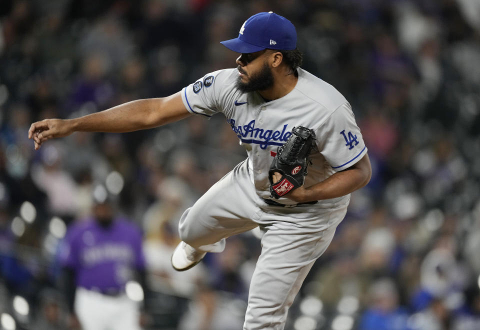 Los Angeles Dodgers relief pitcher Kenley Jansen works against the Colorado Rockies in the ninth inning of a baseball game Tuesday, Sept. 21, 2021, in Denver. (AP Photo/David Zalubowski)