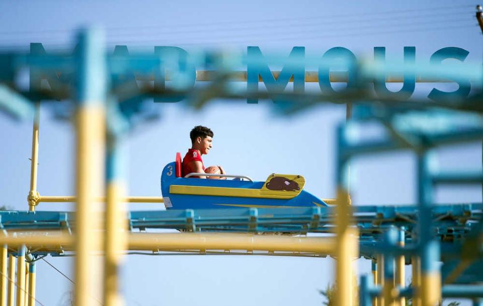 Plainview's Jace DeLaGarza rides the Mad Mouse roller coaster at Joyland.
