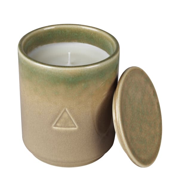 <p>Byredo x Ikea Osynlig Medium Scented Candle in Basil and Mint, $9.99.</p>