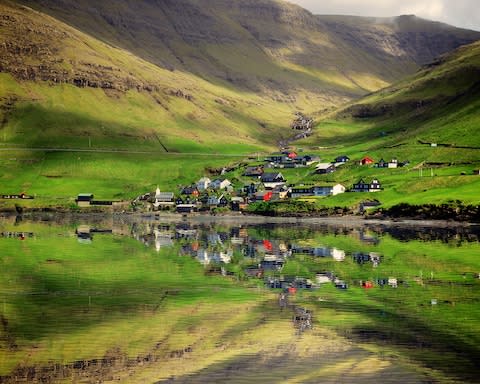 Dinky Bour - a cluster of cabins clinging to the shore - Credit: getty