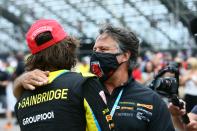 Andretti Autosport team owner Michael Andretti, right, congratulates his driver Colton Herta after winning the Grand Prix of St. Petersburg, Sunday, April 25, 2021 in St. Petersburg, Fla. (Luis Santana/Tampa Bay Times via AP)