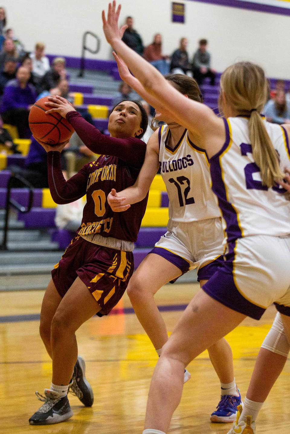 Berne Union's Abbe Evans (0) tries to fight an opening for a shot against Bloom-Carroll in girls varsity basketball action at Bloom-Carroll High School in Carroll, Ohio on January 20, 2022.