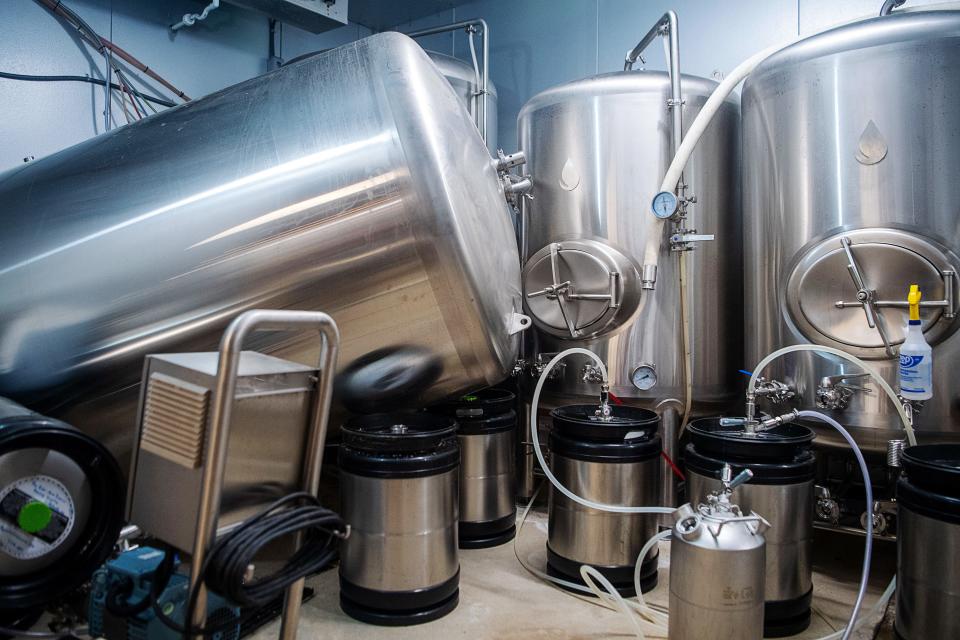 Two of The River Arts District Brewing Company’s Brite tanks were tipped during flooding in the brewery’s basement.