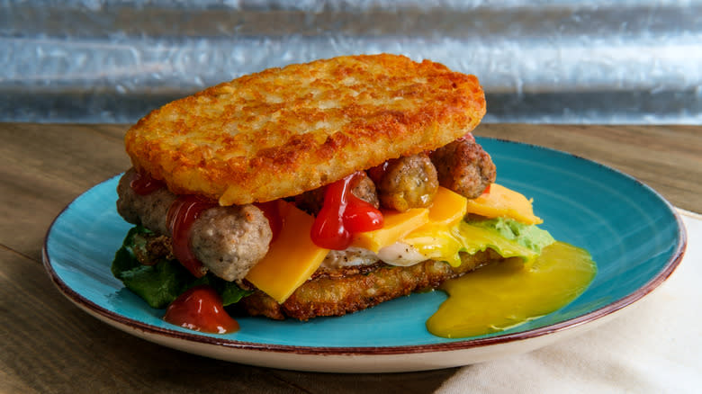hashbrown breakfast sandwich on plate