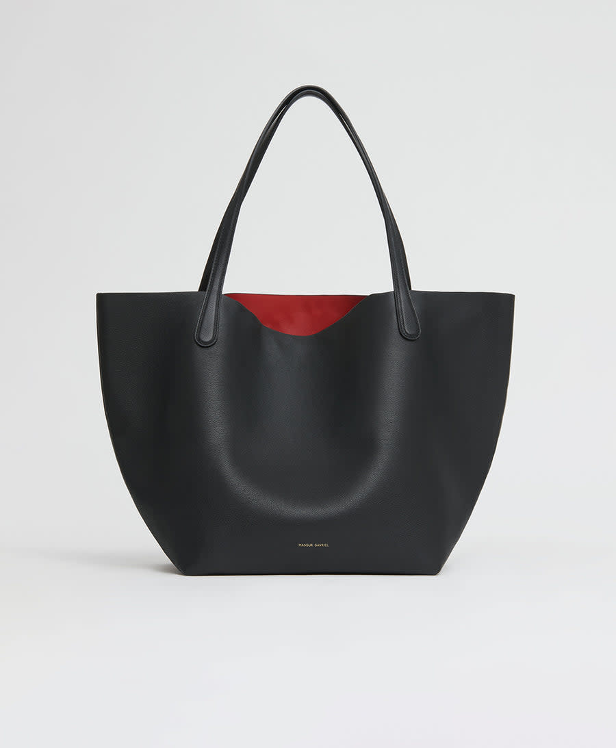 <p><a href="https://go.redirectingat.com?id=74968X1596630&url=https%3A%2F%2Fwww.mansurgavriel.com%2Fproducts%2Feveryday-soft-tote-black-flamma&sref=https%3A%2F%2Fwww.townandcountrymag.com%2Fstyle%2Ffashion-trends%2Fg44576497%2Fbest-oversized-tote-bags%2F" rel="nofollow noopener" target="_blank" data-ylk="slk:Shop Now;elm:context_link;itc:0;sec:content-canvas" class="link ">Shop Now</a></p><p>Everyday Soft Tote</p><p>$795.00</p><p>mansurgavriel.com</p>