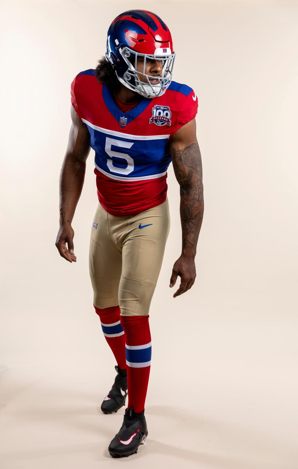 OLB Kayvon Thibodeaux (5) wears the Giants' Century Red uniforms commemorating the franchise's 100th season.