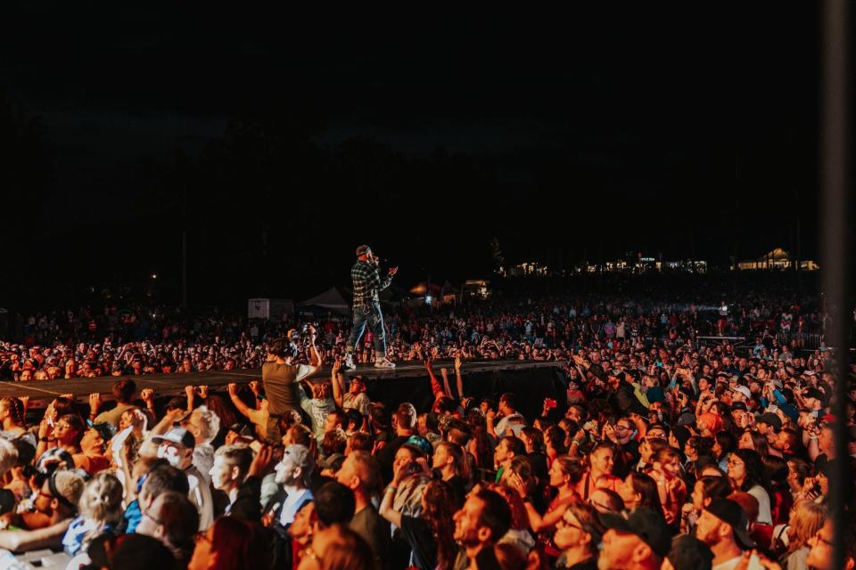 A singer walks out from stage during a past Alive Music Festival performance. This week's event features Skillet, for King & Country, TobyMac, We Are The Kingdom and several other acts.