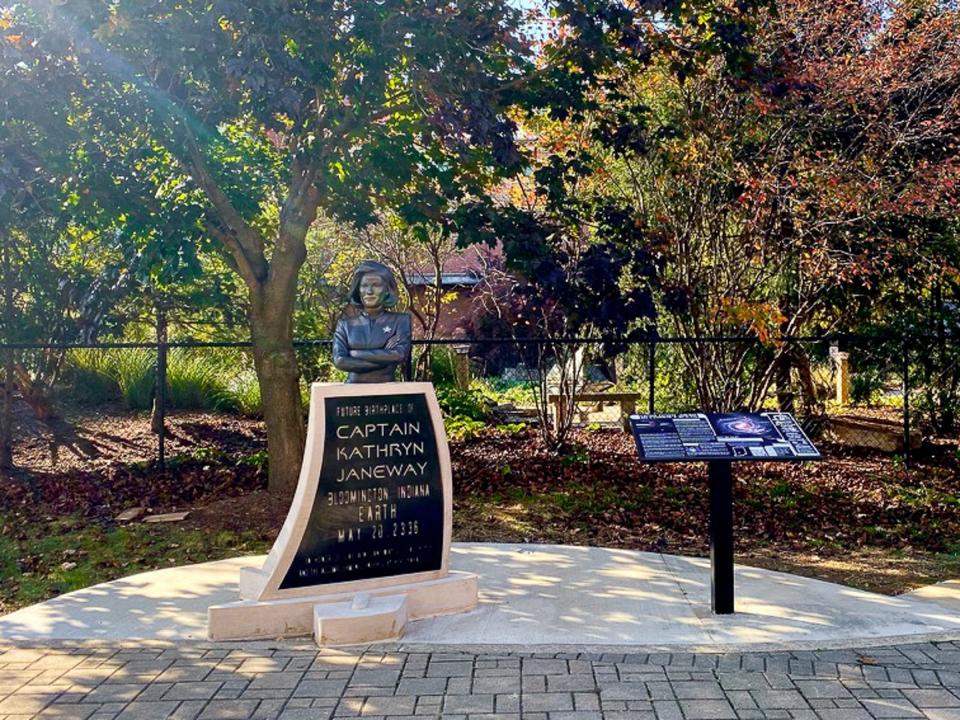 With the crowd from Saturday’s unveiling dispersed, the Captain Janeway monument stands along the B-Line Trail, next to WonderLab Museum in downtown Bloomington. (Josh Dinner / Herald-Times)