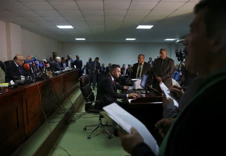 Judge Medhat al-Mahmoud, presiding over the supreme federal court, reads a verdict on appeals concerning amendment of an election law in Baghdad, Iraq June 21, 2018. REUTERS/Abdullah Dhiaa al-Deen