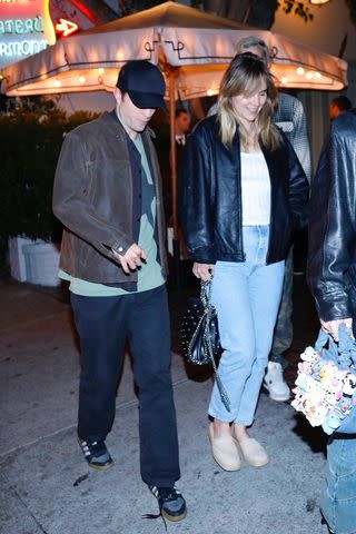 <p>BACKGRID</p> Robert Pattinson and Suki Waterhouse on a date on May 31