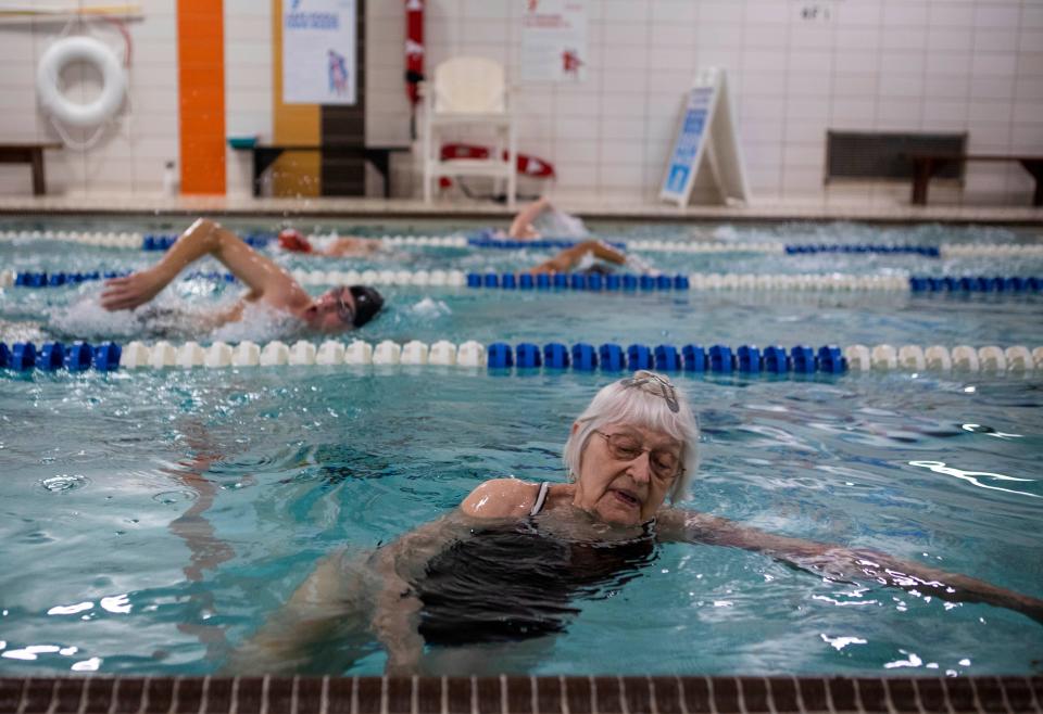 Jean Romero, 93 of Chillicothe, swims her daily laps at the YMCA of Ross County to go and work out on Dec. 20, 2022 in Chillicothe, Ohio. Jean uses the Chillicothe Transit System to get the YMCA everyday. The Chillicothe Transit System provides free transportation for local passengers in need of transportation around the Chillicothe area.