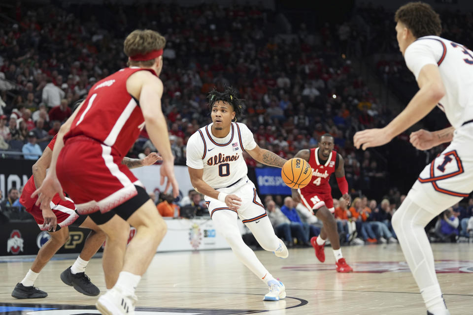 Illinois guard Terrence Shannon Jr. (0) works toward the basket during the first half of an NCAA college basketball game against Nebraska in the semifinal round of the Big Ten Conference tournament, Saturday, March 16, 2024, in Minneapolis. (AP Photo/Abbie Parr)