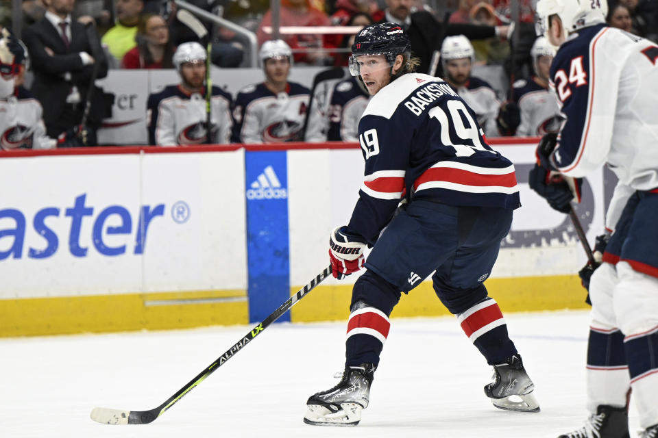 Washington Capitals center Nicklas Backstrom (19) plays during the first period of an NHL hockey game against the Columbus Blue Jackets, Sunday, Jan. 8, 2023, in Washington. (AP Photo/Terrance Williams)