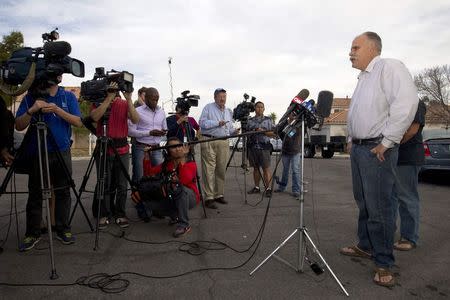 Robert Meyers, the husband of shooting victim Tammy Meyers, speaks to reporters in front of the family home in Las Vegas, Nevada February 19, 2015. REUTERS/Las Vegas Sun/Steve Marcus