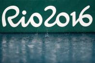 <p>Rain falls on the track at the Olympic Stadium on Day 10 of the Rio 2016 Olympic Games on August 15, 2016 in Rio de Janeiro, Brazil. (Getty) </p>