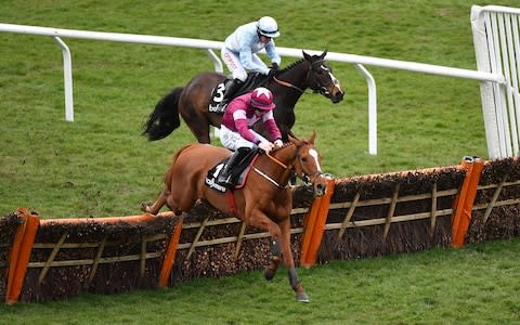 Samcro, with Jack Kennedy up, clears the last ahead of Black Op, with Noel Fehily up - Credit: Seb Daly/Sportsfile via Getty Images