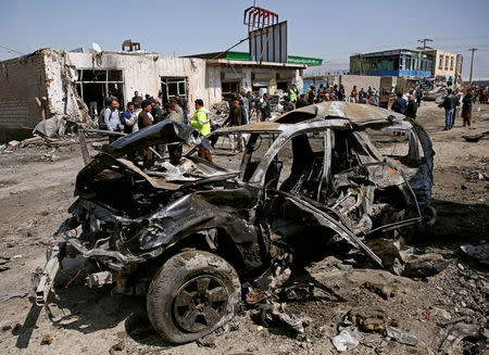 A damaged vehicle is seen after a blast in Kabul, Afghanistan March 17, 2018.REUTERS/Mohammad Ismail