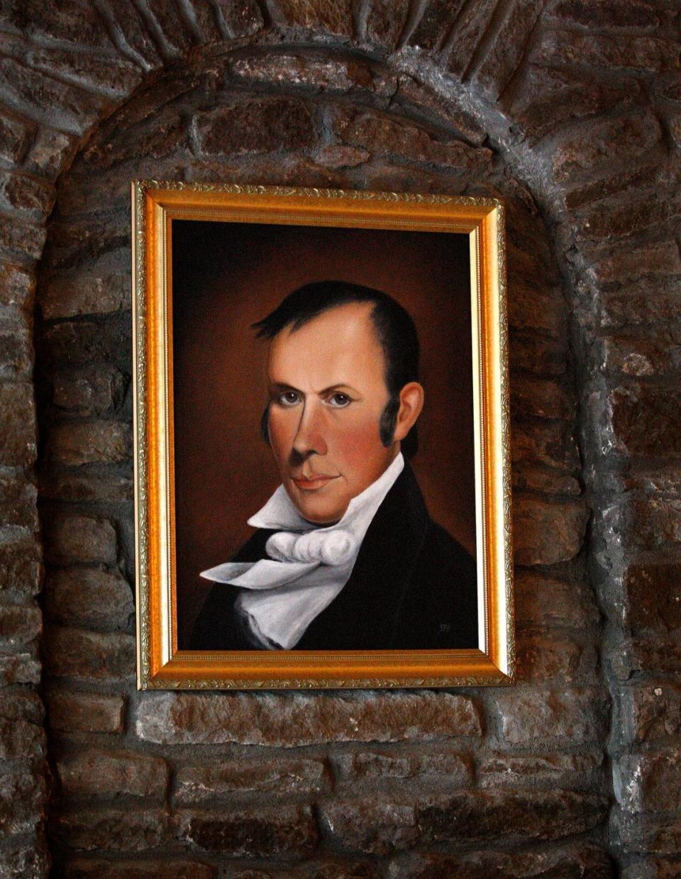 Portrait of Henry Clay hangs above the fireplace on opening night at Henry Clay Public House in Lexington.