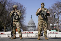 National Guard keep watch on the Capitol, Thursday, March 4, 2021, on Capitol Hill in Washington. Capitol Police say they have uncovered intelligence of a "possible plot" by a militia group to breach the U.S. Capitol on Thursday, nearly two months after a mob of supporters of then-President Donald Trump stormed the iconic building to try to stop Congress from certifying now-President Joe Biden's victory. (AP Photo/Jacquelyn Martin)