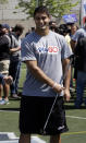 Eastern Illinois' Jimmy Garoppolo tries out his putting skills during an NFL event in New York, Wednesday, May 7, 2014. The event was to promote Play 60, an NFL program which encourages kids to be active for a healthy life. (AP Photo/Seth Wenig)