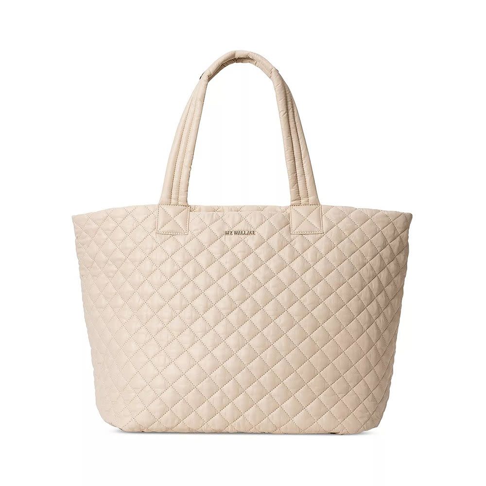 <p><a href="https://go.redirectingat.com?id=74968X1596630&url=https%3A%2F%2Fwww.bloomingdales.com%2Fshop%2Fproduct%2Fmz-wallace-large-metro-tote-deluxe%3FID%3D3640791&sref=https%3A%2F%2Fwww.elle.com%2Ffashion%2Fshopping%2Fg43699315%2Feditor-mothers-day-gift-guide-2023%2F" rel="nofollow noopener" target="_blank" data-ylk="slk:Shop Now;elm:context_link;itc:0;sec:content-canvas" class="link rapid-noclick-resp">Shop Now</a></p><p>Large Metro Tote Deluxe</p><p>$295.00</p><p>bloomingdales.com</p>