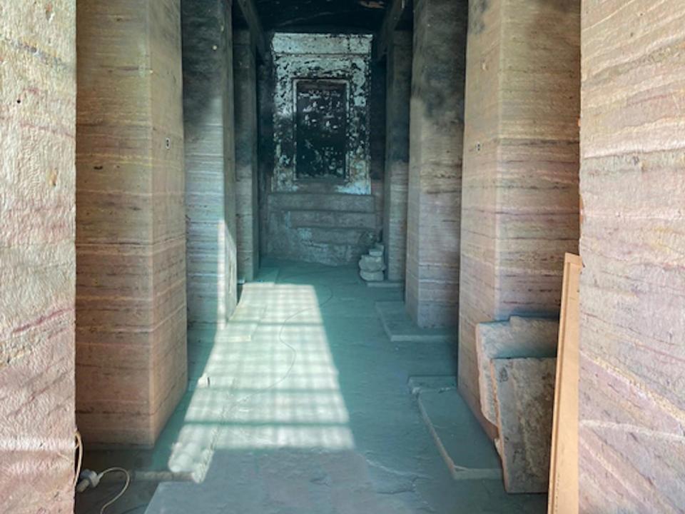 A tomb in Qubbet el-Hawa is shown in Winter. The light filtering into the tomb seems to line up with the back of the tomb.