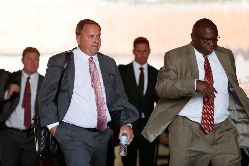 Ohio State assistant coaches Kevin Wilson, left, and Tony Alford on Aug. 31, 2017.