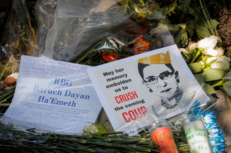 A makeshift memorial for recently passed Associate Justice of the Supreme Court of the United States Ruth Bader Ginsburg is seen outside her childhood home in Brooklyn, New York