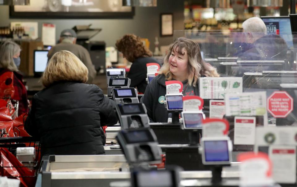 Sendik's employee Lorrie Sherrer checks out a customer at Sendik's Food Market in Germantown on Wednesday, Nov. 24, 2021, which was the busiest grocery shopping day of the year. Sendik's said Tuesday it is opening a new store in Oconomowoc in western Waukesha County.