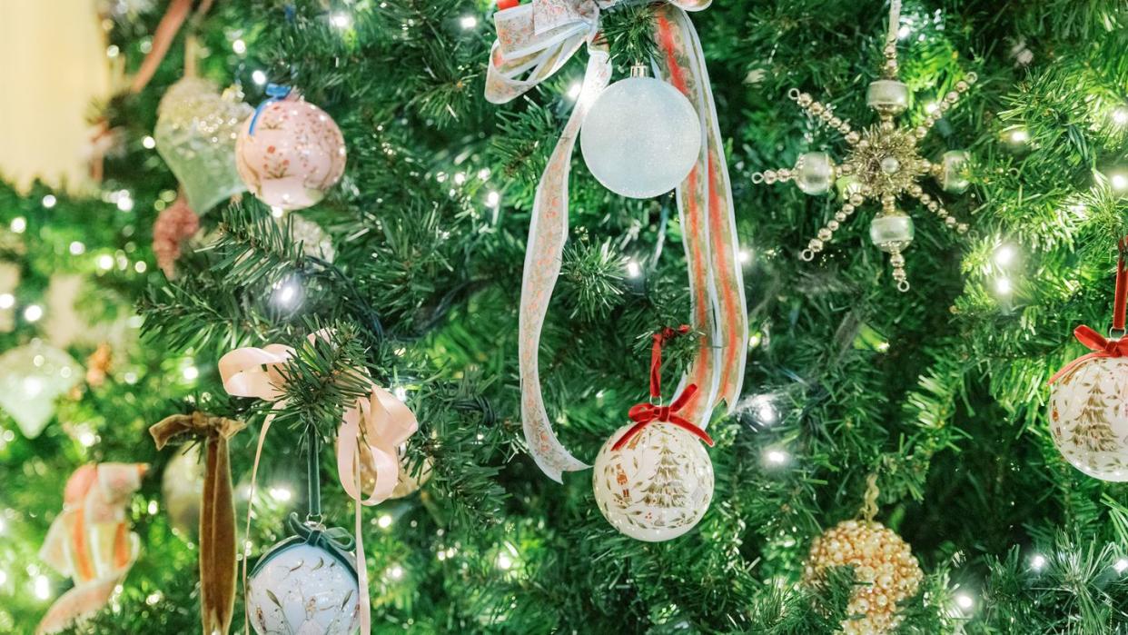 a christmas tree decorated with ornaments and lights