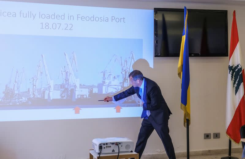 Viacheslav Chuprynskyi, economic attache at the Ukraine embassy in Lebanon, points towards a screen during a news conference in Baabda