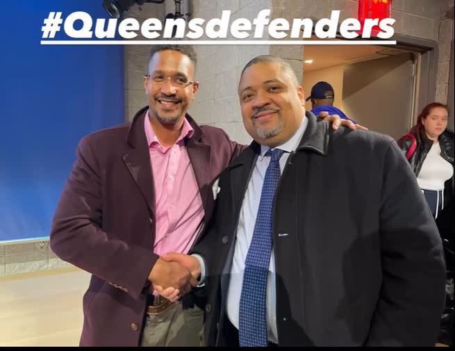 Sheldon Johnson (left), shown shaking hands with Manhattan DA Alvin Bragg, started working as a staff member at the public law firm Queens Defenders at some point after his prison release. sheldon Johnson/Facebook