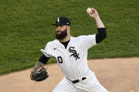 Chicago White Sox starting pitcher Dallas Keuchel delivers during the first inning of a baseball game against the Minnesota Twins Wednesday, May 12, 2021, in Chicago. (AP Photo/Charles Rex Arbogast)